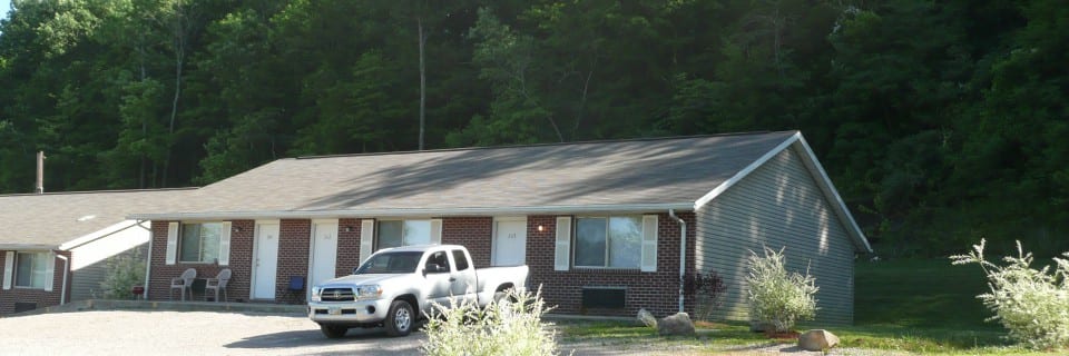 Pickup Truck in front of a house